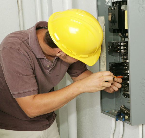 Orange County Electrician Fixing A Breaker